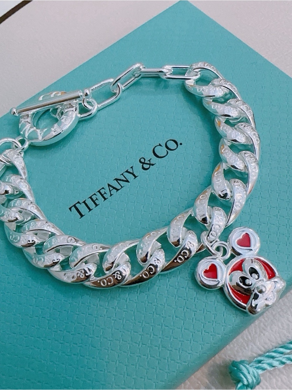 Tiffany & Co. Silver Curb Bracelet with Red Enamel Mouse Charm